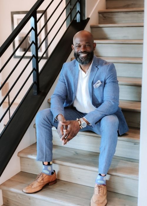 Bennie Bell sitting on stairs